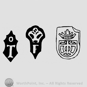 A shield with a circle and a T, A shield with a crown and an uppercase F and a shield with a crown above a shield