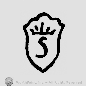 A shield with a crown and an uppercase S
