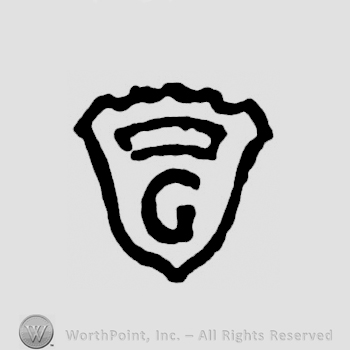 An uppercase G under a crown on a shield