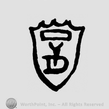A shield with the initials D Y on it