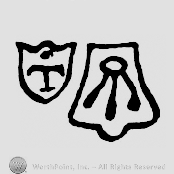 A shield with a T and a shield with part of a flower