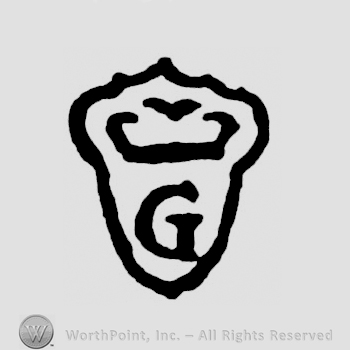 A shield with a crown and an uppercase G