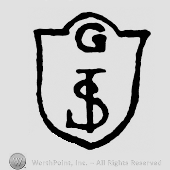 A shield with the initials G S T on it