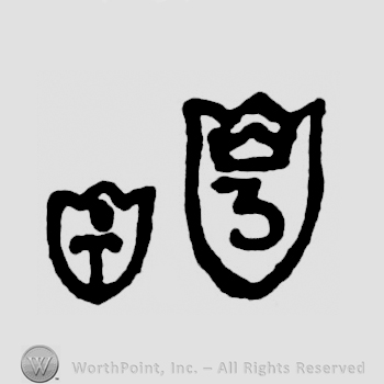 A shield with an uppercase W and a shield with a crown and the figure 3