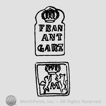 A crown above the name Fran Ant Garz and a crown with a crowned lion and a pegasus