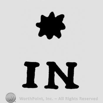 The initials I N under a star