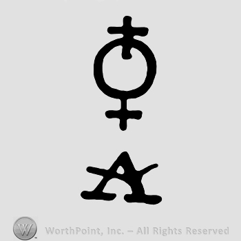 A circle with two crosses above an uppercase A