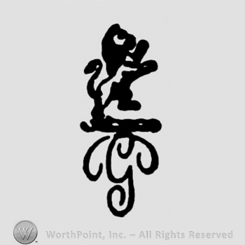 A lion above a monogram