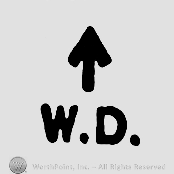 The initials W D under an arrow
