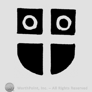 A shield split in four with circles on the upper parts