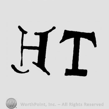 The intiials H T in uppercase