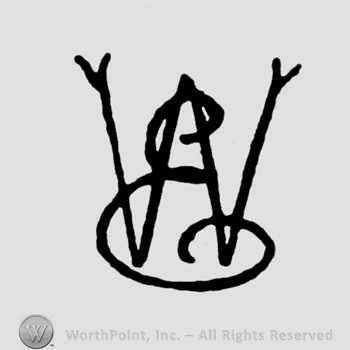 The initials W E overlapping
