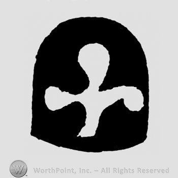 A shield with a clover tri leaf