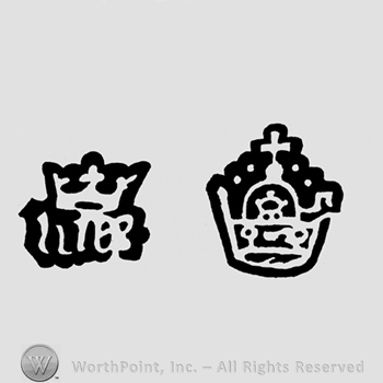 A crown above the word mer and a crown with a cross above