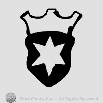 A crown above a shield with a star