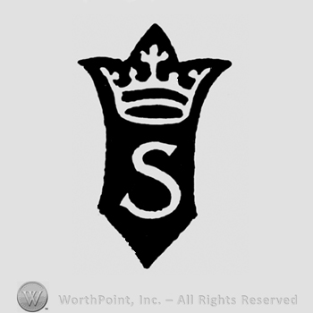 A crown above an uppercase S on a shield