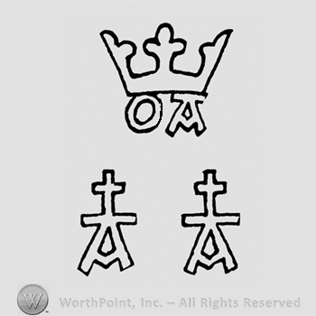 A crown above the initials O A above two split crosses with uppercase A leters in the base
