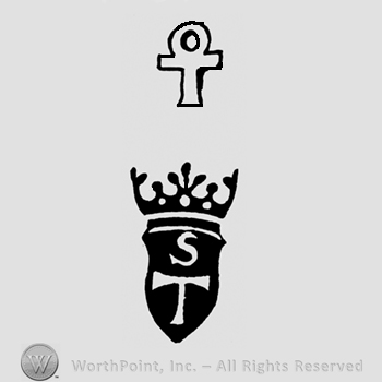A coptic cross above a crown and a shield with the initials S T