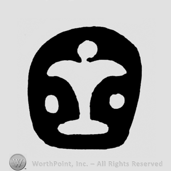 A shield shape with a fleur de lis or a bird shape and two dots