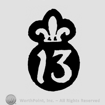 A fleur de lis above the number 13