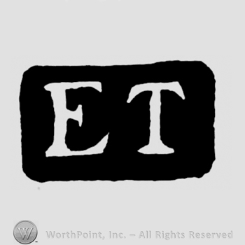 The initials E T inside a rectangle