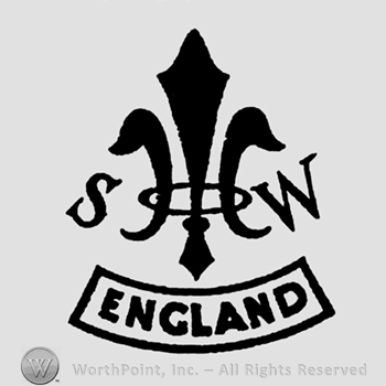 Fleur de lis and letters SW;word England below.