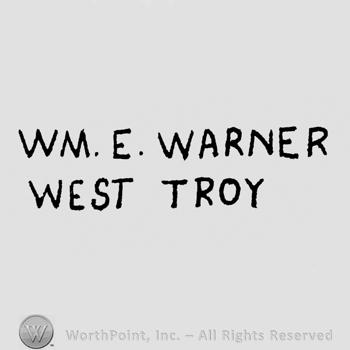 written on 2 lines: WM.E. WARNER above, WEST TROY under