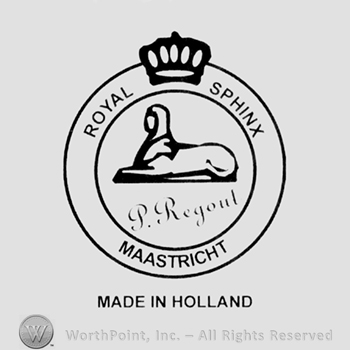 Circle with crown;sphinx with P Regout in the middle;Made In Holland below.