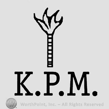 Letters KPM and a shape similar with a flame on top