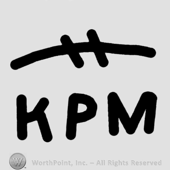 Letters KPM with a line on top.