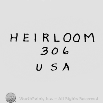 written on 3 lines: HEIRLOOM on top, 306, USA