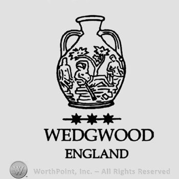 Vase and three stars below;Wedgwood England at the bottom.