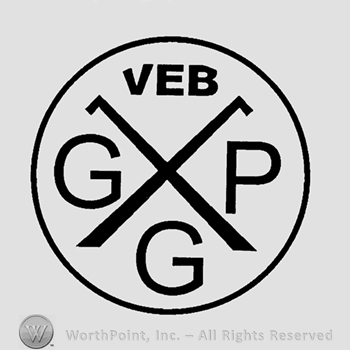 Circle with cross inside and VEB KGC inside.