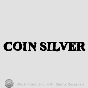 Coin silver written.