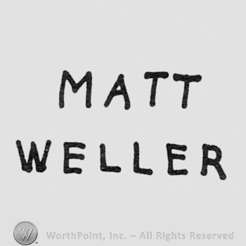 capital writings on 2 lines: MATT, WELLER