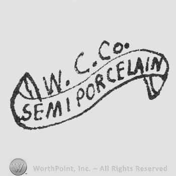 capital initials W. C. Co written in a slanted line above, a ribbon with the writing SEMI PORCELAIN