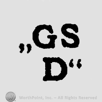 Letters GS over D, all in uppercase.