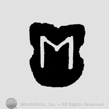 Capital M on a shield.