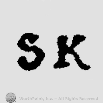 Letters SK in uppercase.