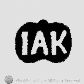 Letters IAK in uppercase.