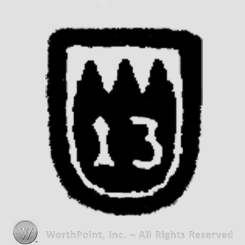 A shield with number 13 inside.