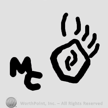 A bear paw and letters MC.