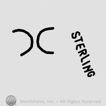 Two letters C,on updide down;word Sterling