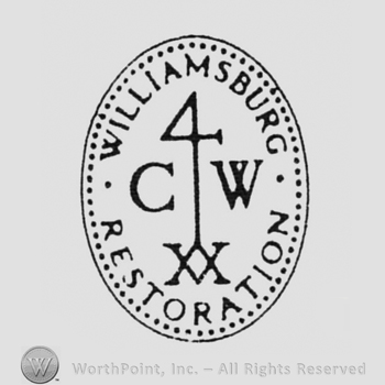 written inside an oval: curved WILLIAMSBURG above, RESTORATION under, initials C W in the middle, XX under