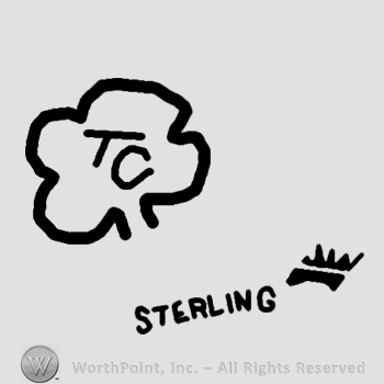 TC written inside a clover and word Sterling outside.