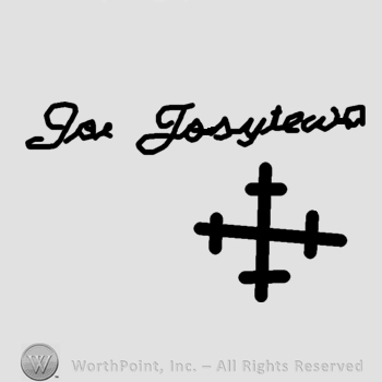 Joe Josytewa written and a snowflake or a cross