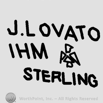 J Lovato IHM Sterling written;a bird in the middle.