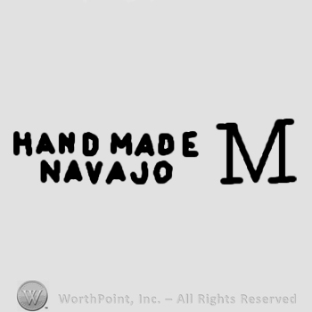 Hand Made Navajo M written.