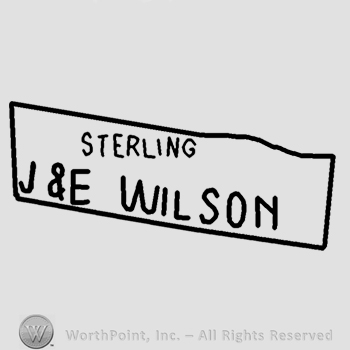 Sterling J&E Wilson written inside a rectangle.