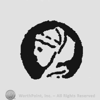 The image of a covered human head in profile.
